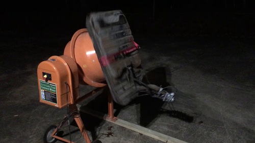 Gas tank cleaning with a concrete mixer