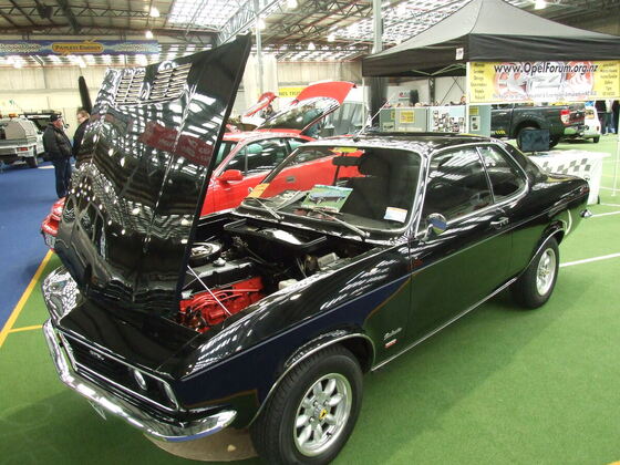 Opel Manta A on club stand in Dunedin, NZ - note chrome bumpers rather than US spec! ;)